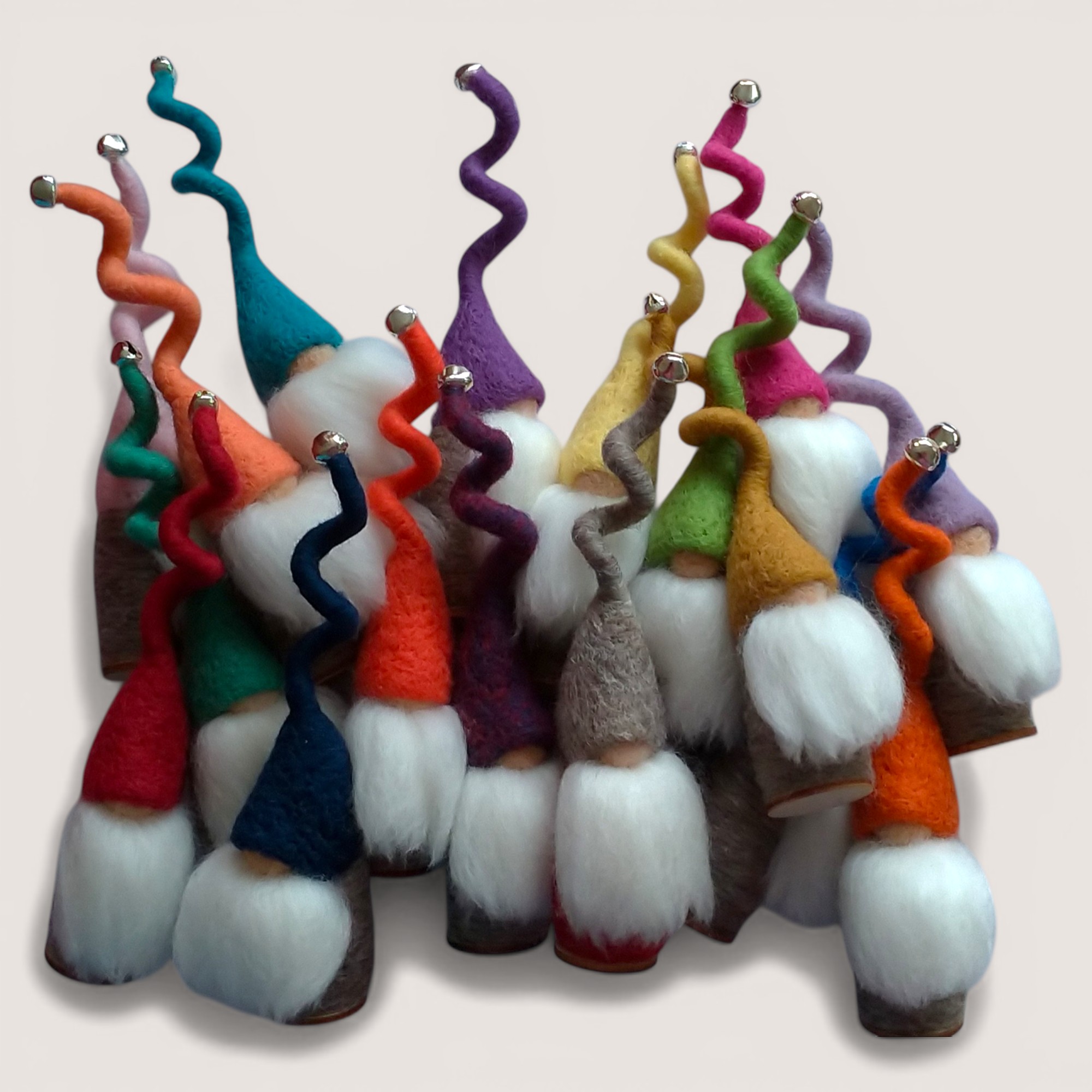 Close-up of needle felted Tomten in autumn colours, handmade wool figures by Grey Wren Studio